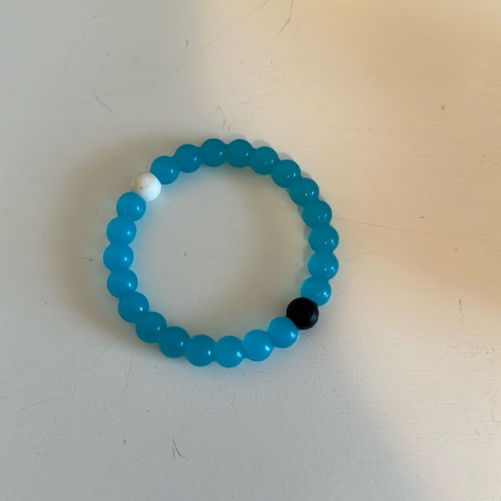 Blue Lokai bracelet. Size small. Never worn.